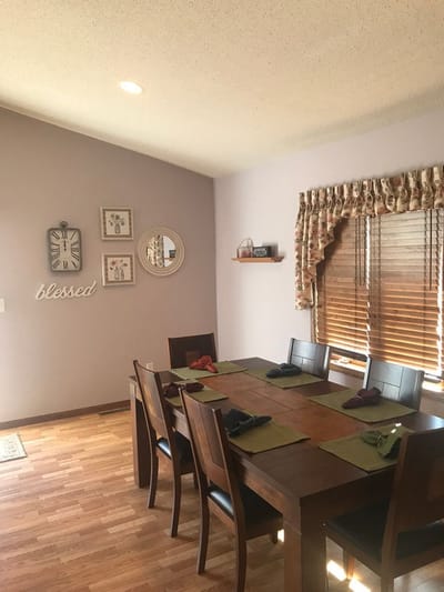 Dining room set up with table and chairs
