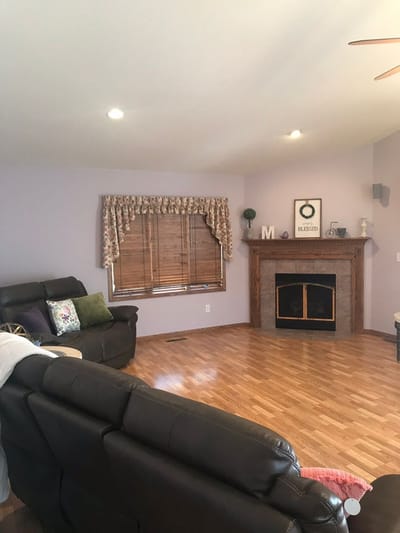 A cozy common area with seating and decorative elements