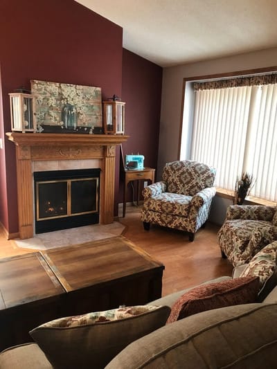Cozy common area with comfortable seating and a fireplace