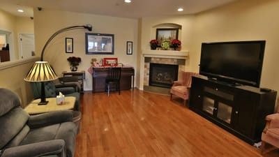 Common area with seating and fireplace