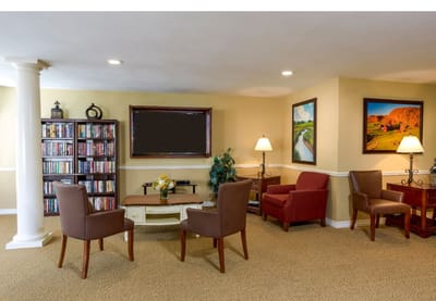 Common area with seating and bookshelves
