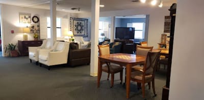 Common area with seating and a television