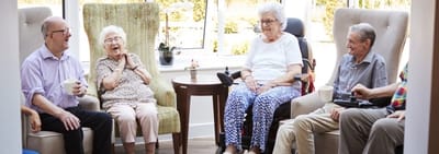 Residents enjoying conversation in a common area