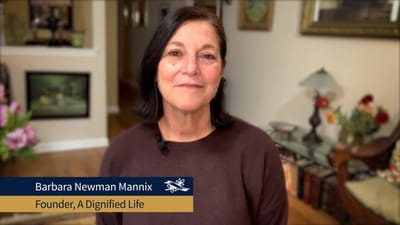 Founder Barbara Newman Mannix speaking in a cozy common area