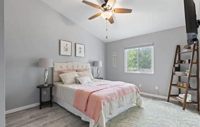 Cozy interior of a private resident room with a bed and decor