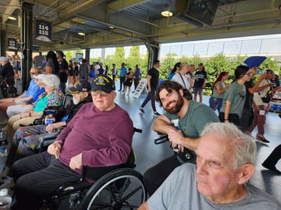 Residents and staff enjoying an outdoor event