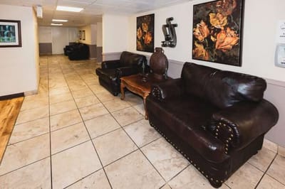 Interior common area with couches and artwork