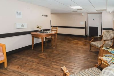 Interior common area with a chess table and seating