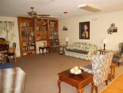 Common area with seating and bookshelves