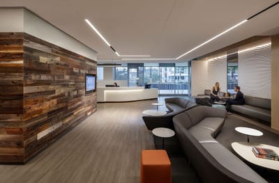 Modern interior of a facility lobby with seating areas