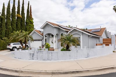 Exterior view of a senior living facility with landscaping