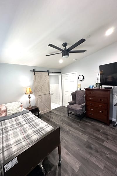 Cozy private resident room with wooden furniture