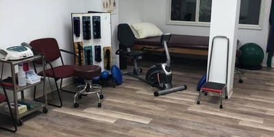 Interior of a therapy room with equipment and seating