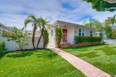 Exterior view of a house with landscaped garden
