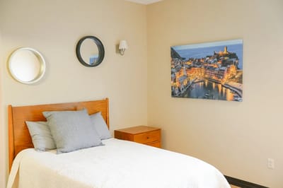 Cozy bedroom with modern decor and artwork