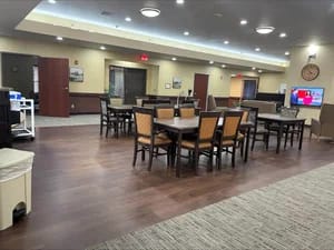 Avita Assisted Living and Memory Care, assisted living in Wichita, KS — Common area with dining tables and seating arrangements