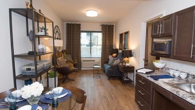 Well-furnished interior of a resident unit with kitchen