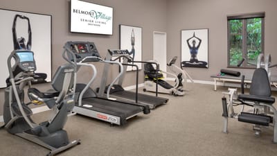 Well-equipped fitness room with exercise machines