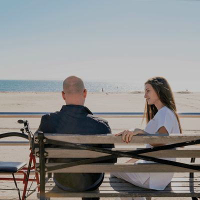 Two people enjoying a day at the beach
