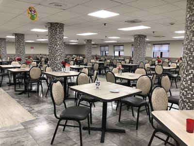 Dining area with tables and decorations.