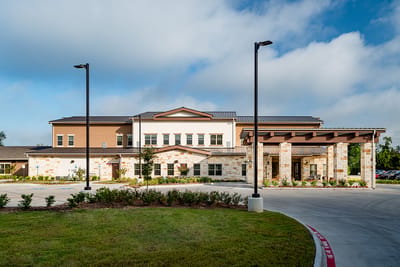 Exterior view of Spring Cypress Senior Living facility