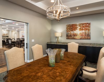 Elegant dining room with a large wooden table and decor