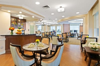 Warm dining area with decorative tables and chairs