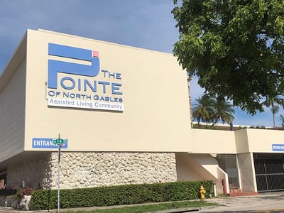 Exterior view of The Pointe of North Gables building
