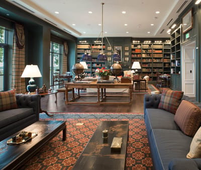 Interior view of a cozy library area with bookshelves
