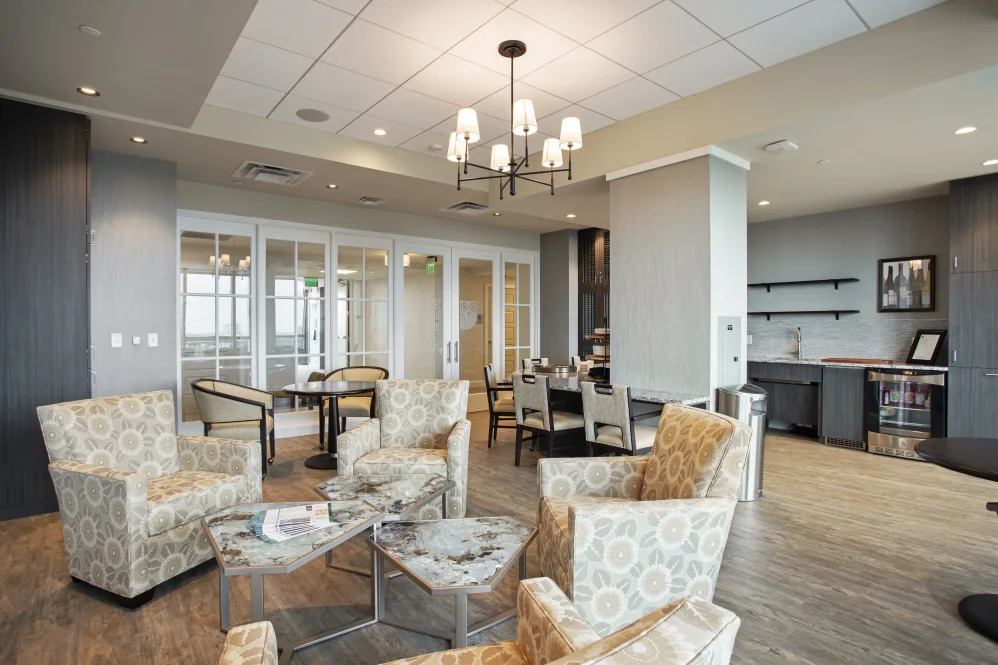 Bright common area with seating and modern decor