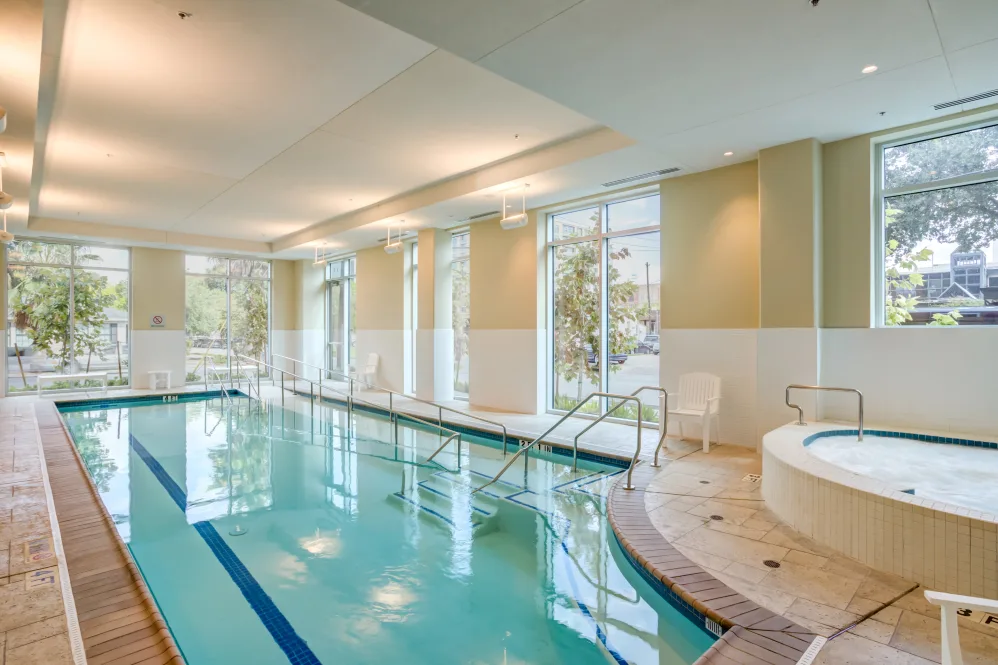 Indoor swimming pool area with natural light