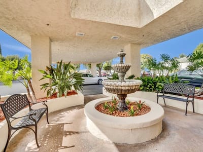 Garden area with a fountain and seating