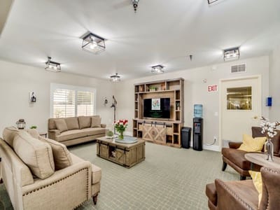 Common area with seating and a TV