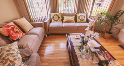 Cozy common area with sofa and decorative pillows