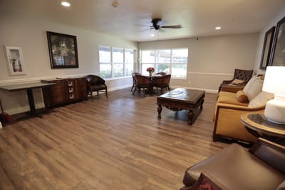 Bright common area with seating and natural light