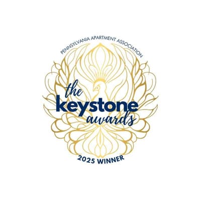 Keystone Awards logo with decorative peacock design