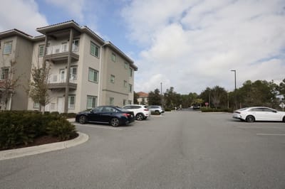 Exterior view of a senior living facility parking lot
