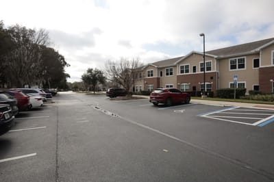 Exterior view of the facility with parking area