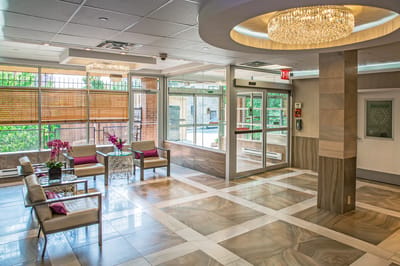 Bright and inviting lobby area with seating and decor