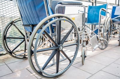 Close-up of a wheelchair on a patio