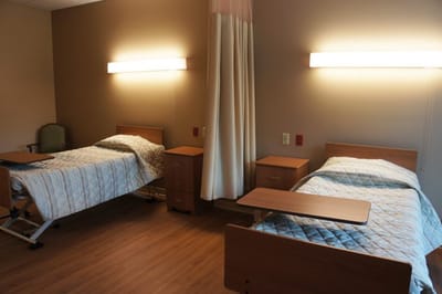 Interior view of a shared resident room with two beds
