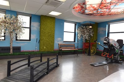 Interior view of a fitness area with exercise equipment