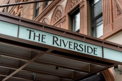 Signage of The Riverside facility entrance
