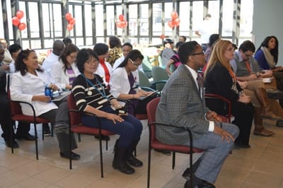 Residents and staff participating in an event in a common area