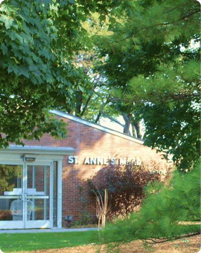 Exterior view of St. Anne's Mead with trees