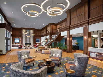 Bright and spacious lobby with modern decor and seating