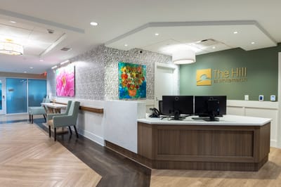 Interior view of the reception area with floral artwork