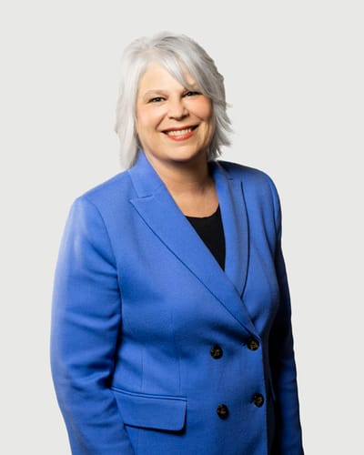 Acacia Health Center at Sagewood, Nursing Home in Phoenix, AZ — Professional woman smiling in a blue blazer