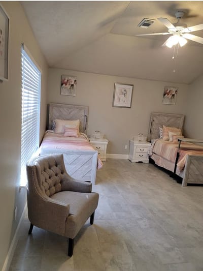 Interior view of a shared resident room with two beds