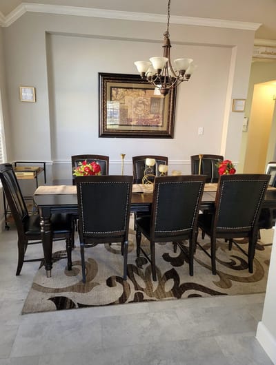 Dining room setup with elegant decor and table settings